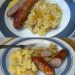 Bratwurst mit Sauerkraut und Kartoffeln